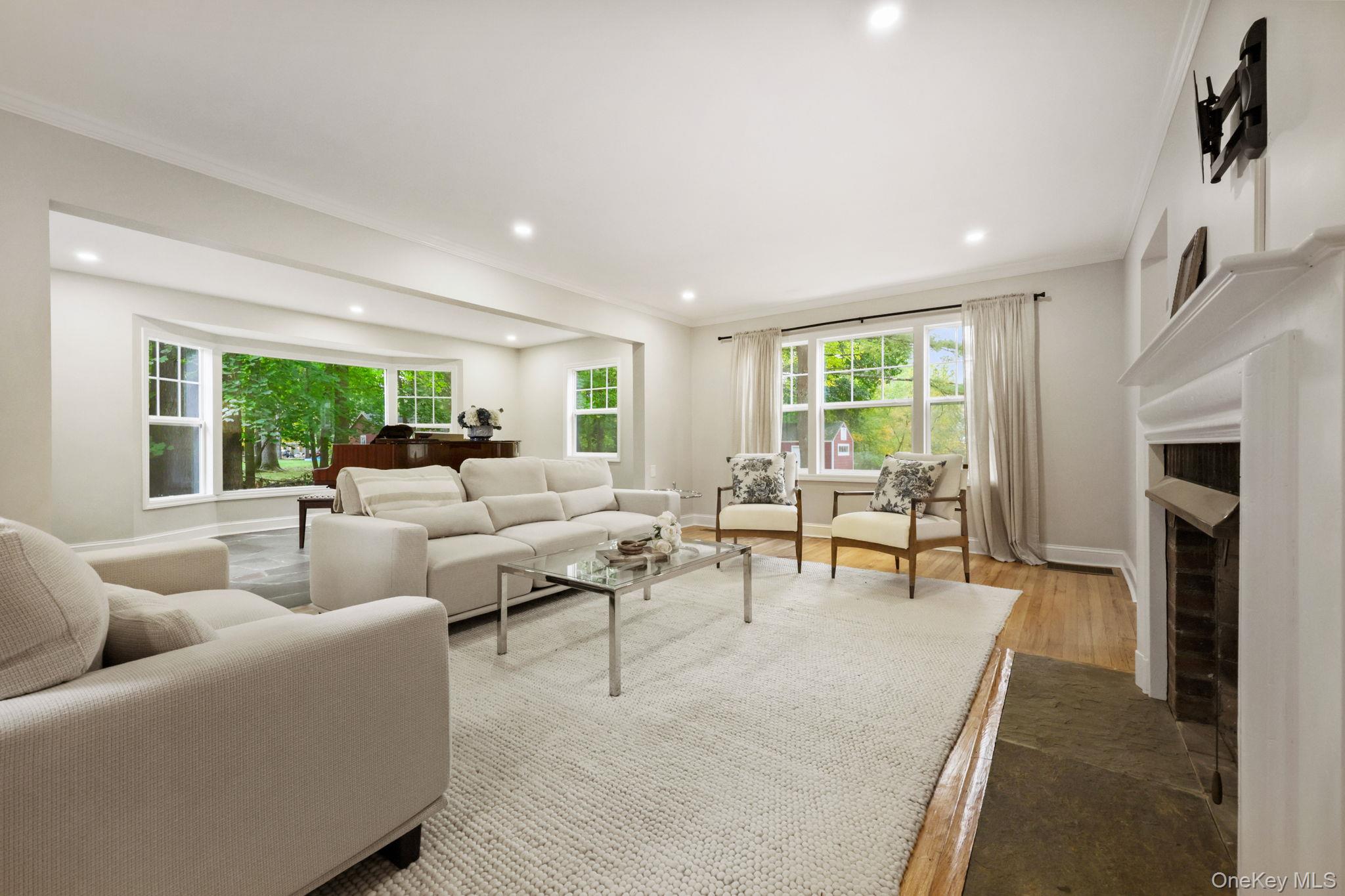 790 Hardscrabble Road Chappaqua, NY 10514 - Photo 6 of 43 a living room with furniture and a fireplace