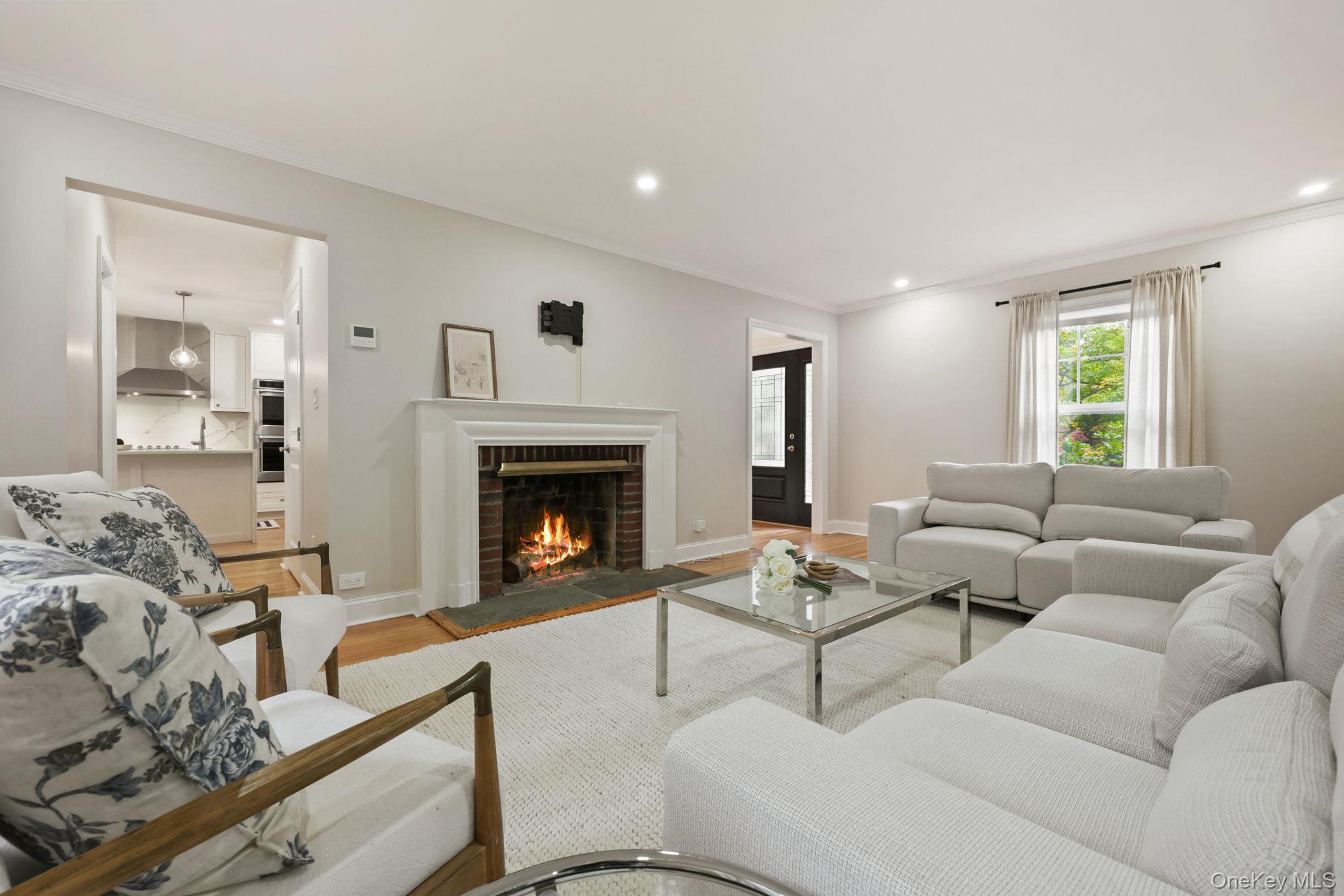 790 Hardscrabble Road Chappaqua, NY 10514 - Photo 9 of 43 a living room with furniture and a fireplace