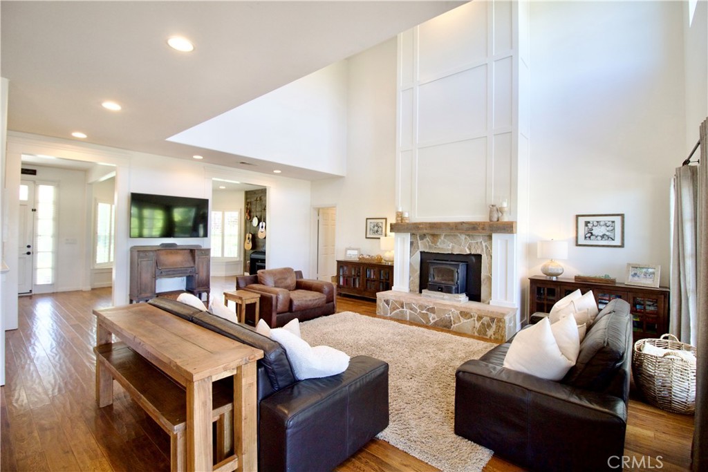 35159 El Dorado Road Lake Elsinore, CA 92530 - Photo 14 of 72 a living room with furniture and a fireplace