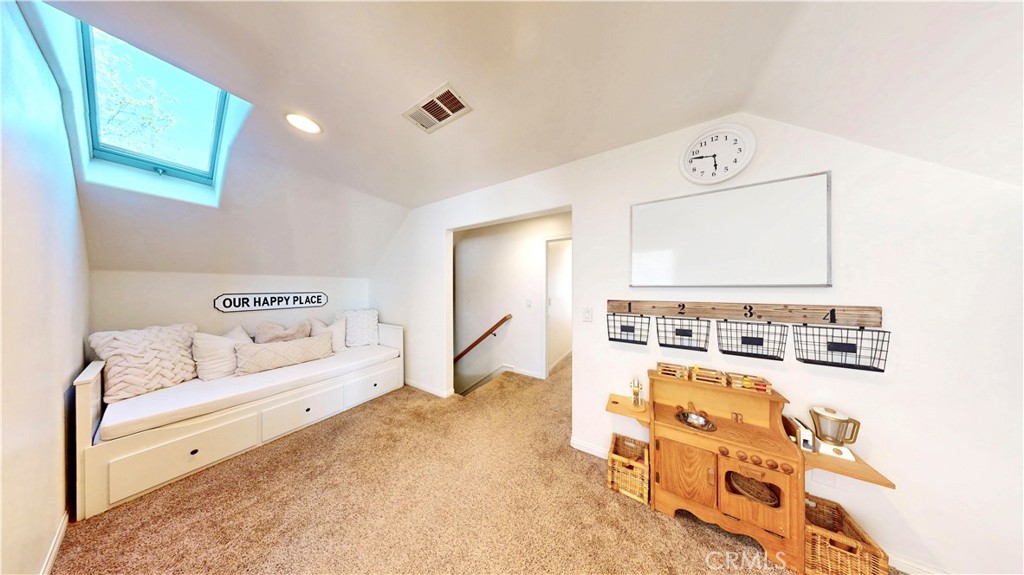 35159 El Dorado Road Lake Elsinore, CA 92530 - Photo 38 of 72 a living room with furniture and a flat screen tv