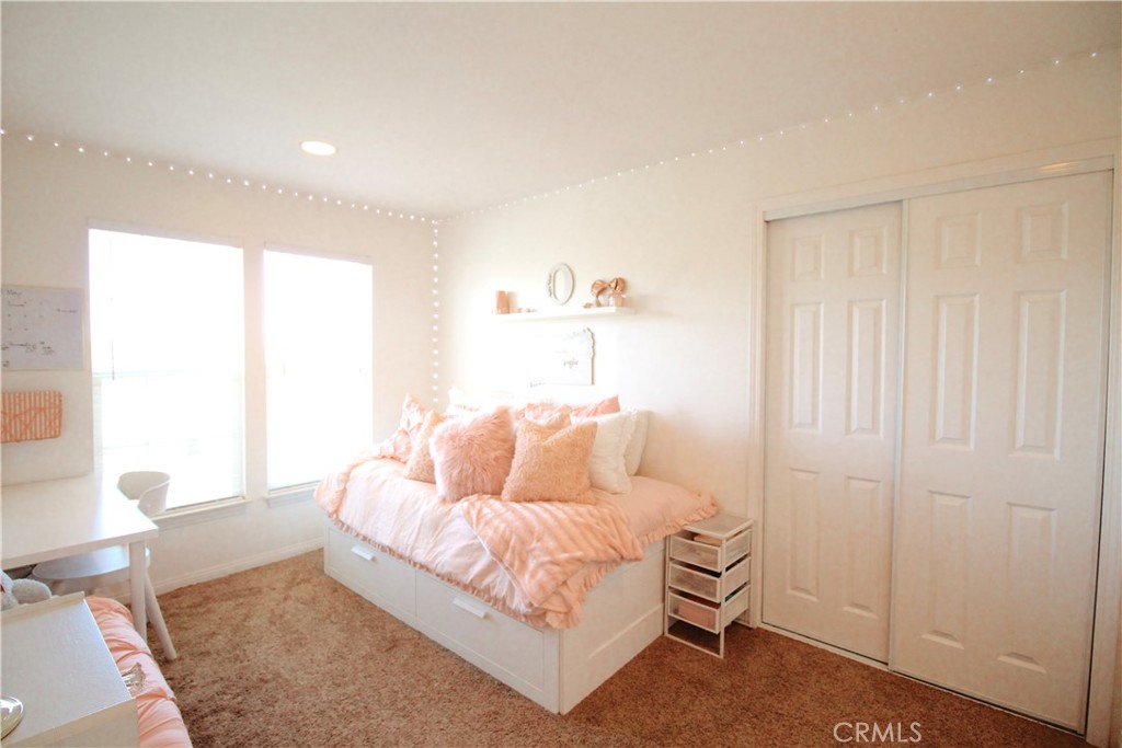 35159 El Dorado Road Lake Elsinore, CA 92530 - Photo 40 of 72 a living room with furniture and a window