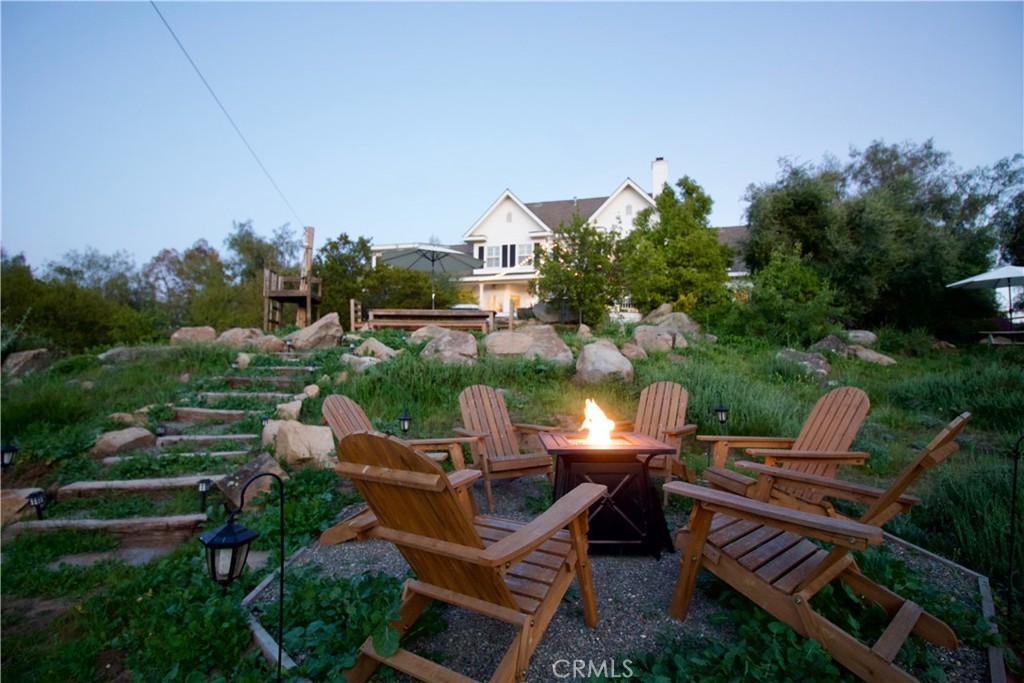 35159 El Dorado Road Lake Elsinore, CA 92530 - Photo 60 of 72 an aerial view of a house with outdoor space patio and outdoor seating