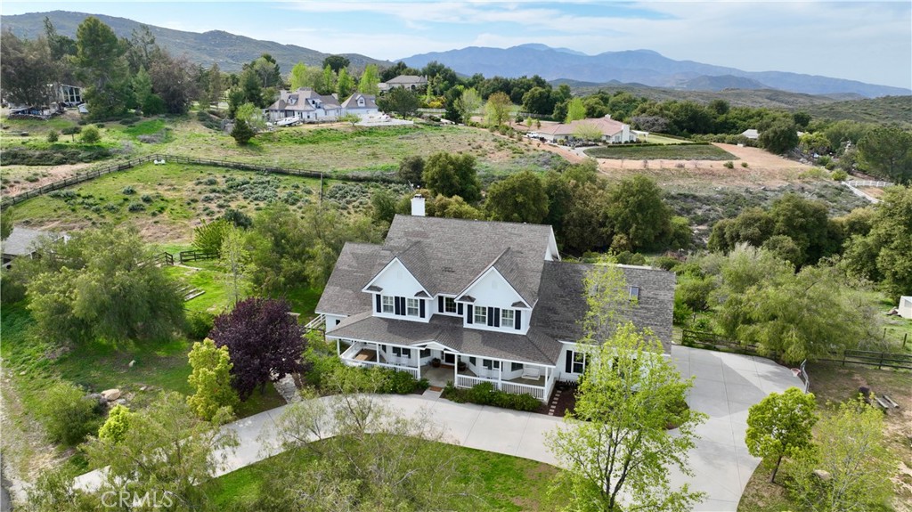 35159 El Dorado Road Lake Elsinore, CA 92530 - Photo 6 of 72 an aerial view of residential houses and outdoor space