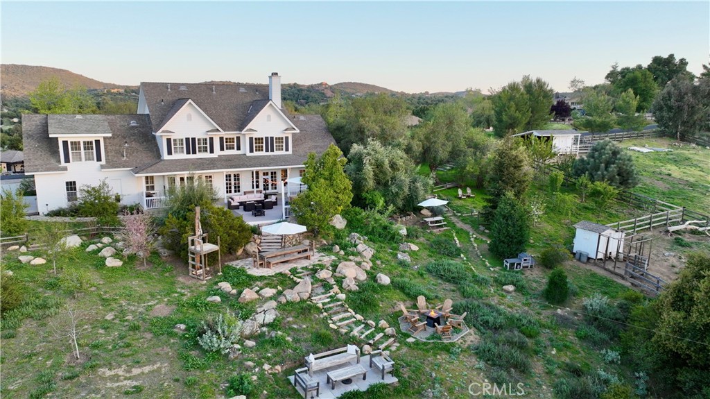35159 El Dorado Road Lake Elsinore, CA 92530 - Photo 7 of 72 an aerial view of residential houses with outdoor space and trees