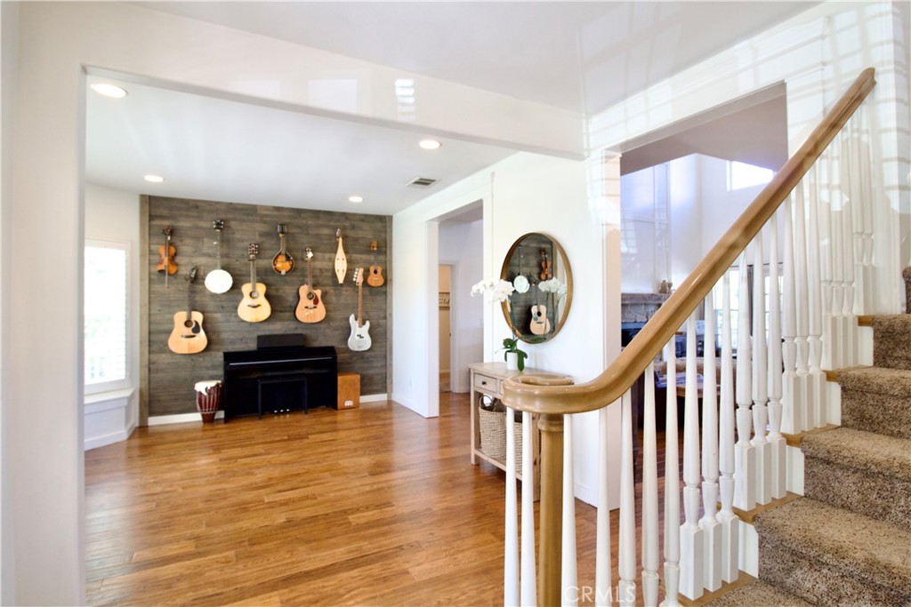 35159 El Dorado Road Lake Elsinore, CA 92530 - Photo 10 of 72 a view of a livingroom with furniture staircase and a fireplace