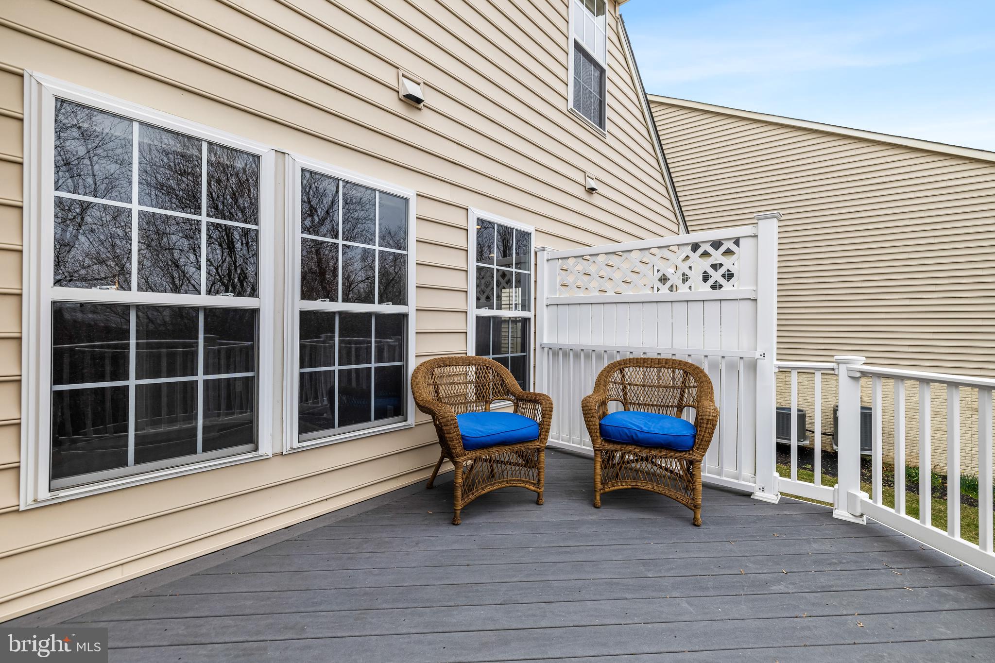 8330 Meadowsweet Road, Unit 8330 Pikesville, MD 21208 - Photo 17 of 55 a blue chairs sitting in front of a house