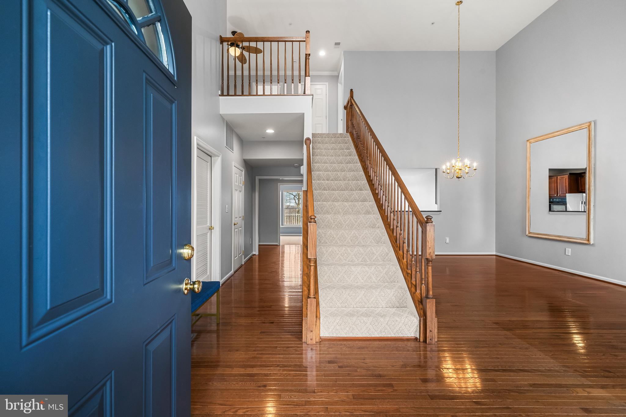 8330 Meadowsweet Road, Unit 8330 Pikesville, MD 21208 - Photo 2 of 55 a view of entryway and hall with wooden floor