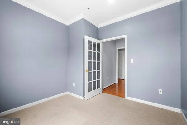 a view of an empty room with stairs