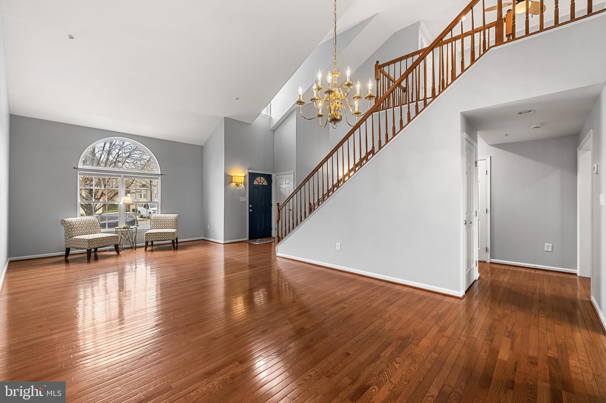 8330 Meadowsweet Road, Unit 8330 Pikesville, MD 21208 - Photo 3 of 55 a view of livingroom with furniture wooden floor and dining room