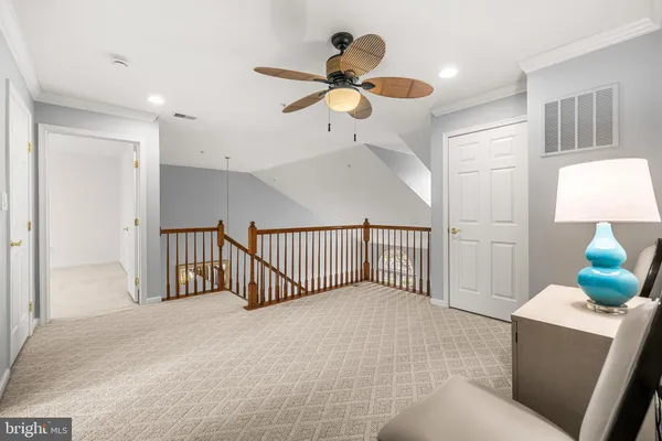 a view of a livingroom with a ceiling fan