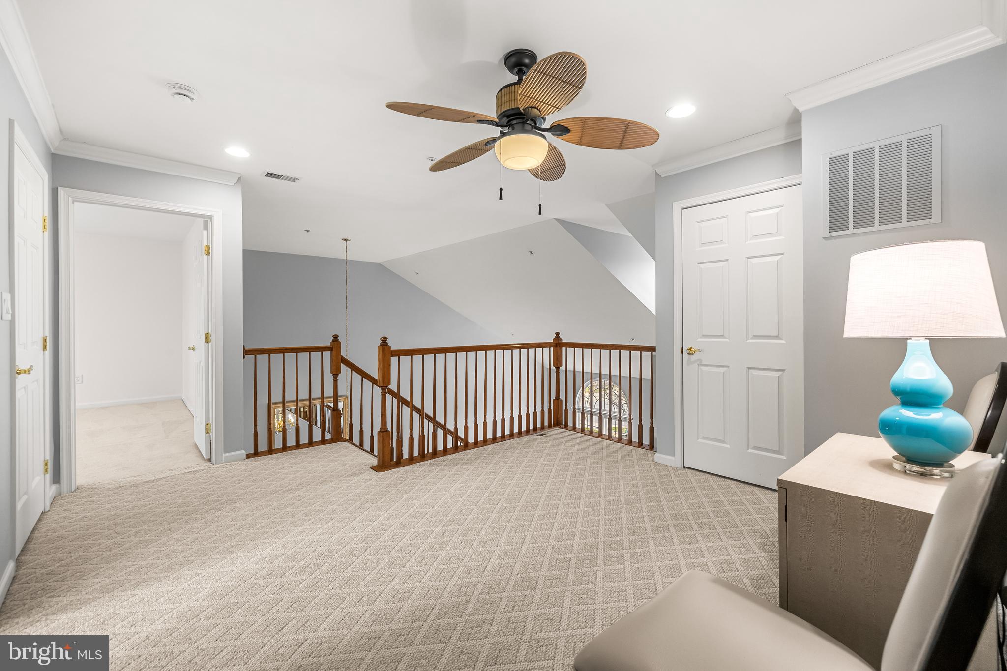 8330 Meadowsweet Road, Unit 8330 Pikesville, MD 21208 - Photo 33 of 55 a view of a livingroom with a ceiling fan