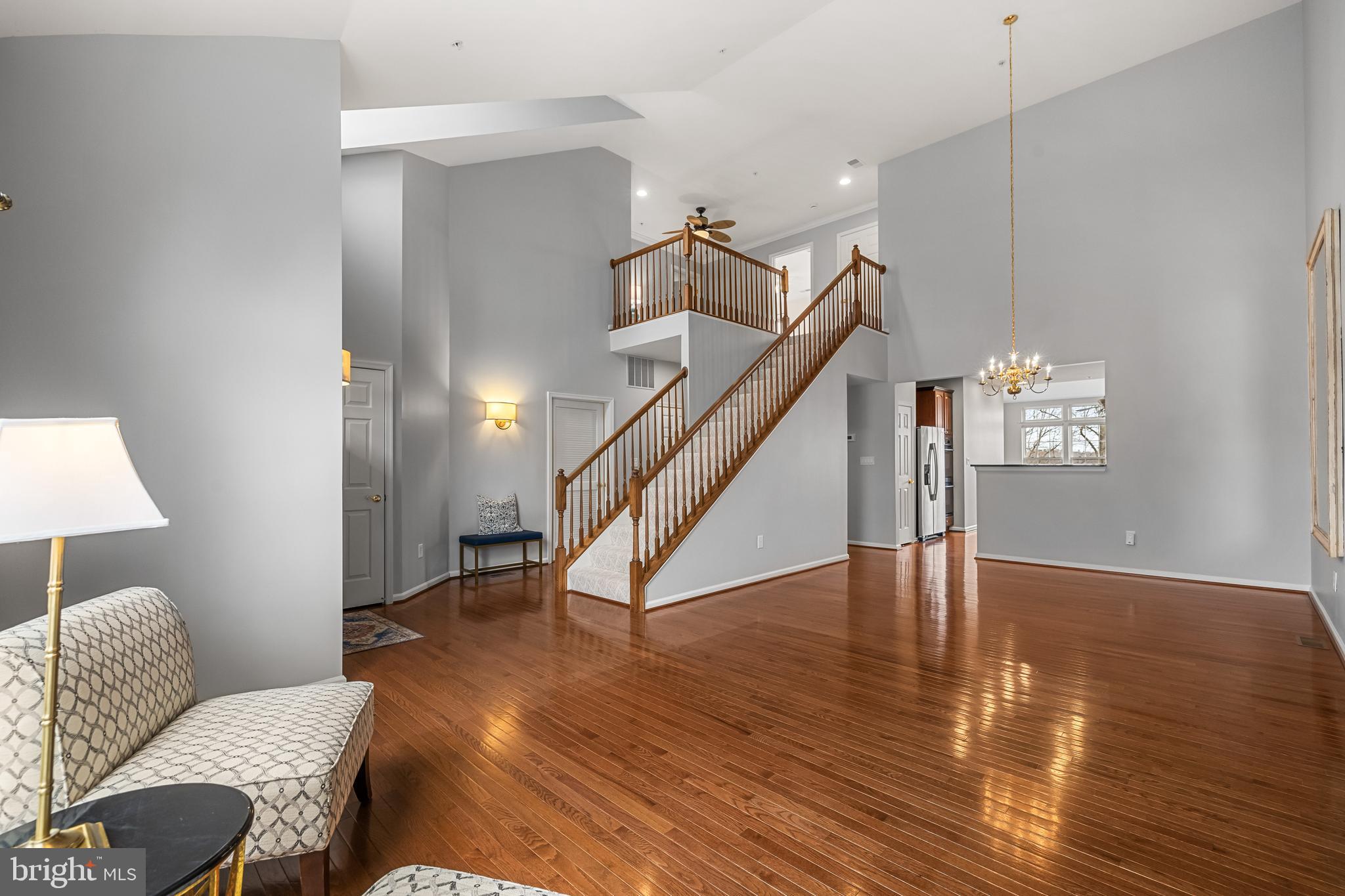 8330 Meadowsweet Road, Unit 8330 Pikesville, MD 21208 - Photo 4 of 55 a view of entryway and hall with wooden floor