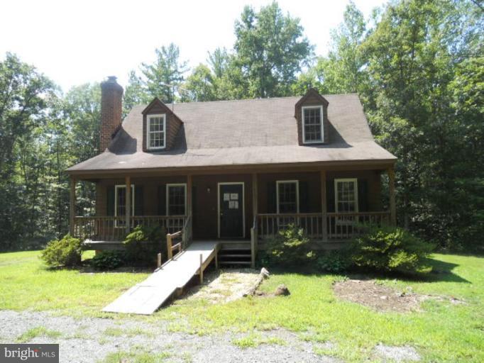 974 Jackson Road Bumpass, VA 23024 - Photo 1 of 1 front view of a house with a yard