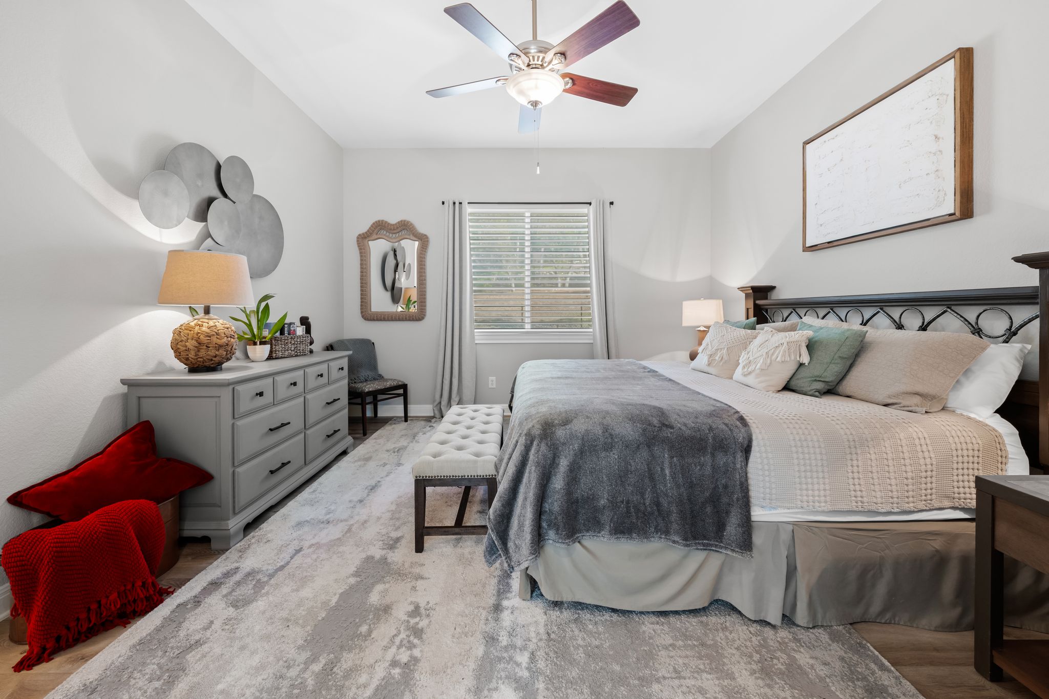 13612 Flat Top Ranch Road Austin, TX 78732 - Photo 14 of 40 a bedroom with a bed and a chandelier