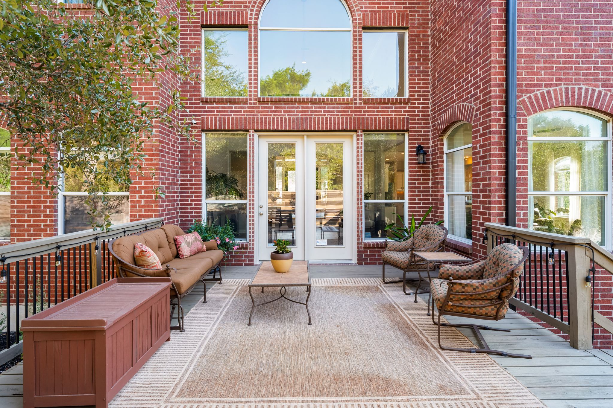 13612 Flat Top Ranch Road Austin, TX 78732 - Photo 29 of 40 a building outdoor space with patio furniture