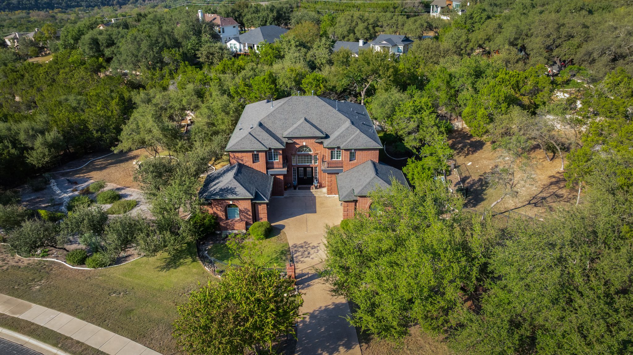 13612 Flat Top Ranch Road Austin, TX 78732 - Photo 38 of 40 an aerial view of a house