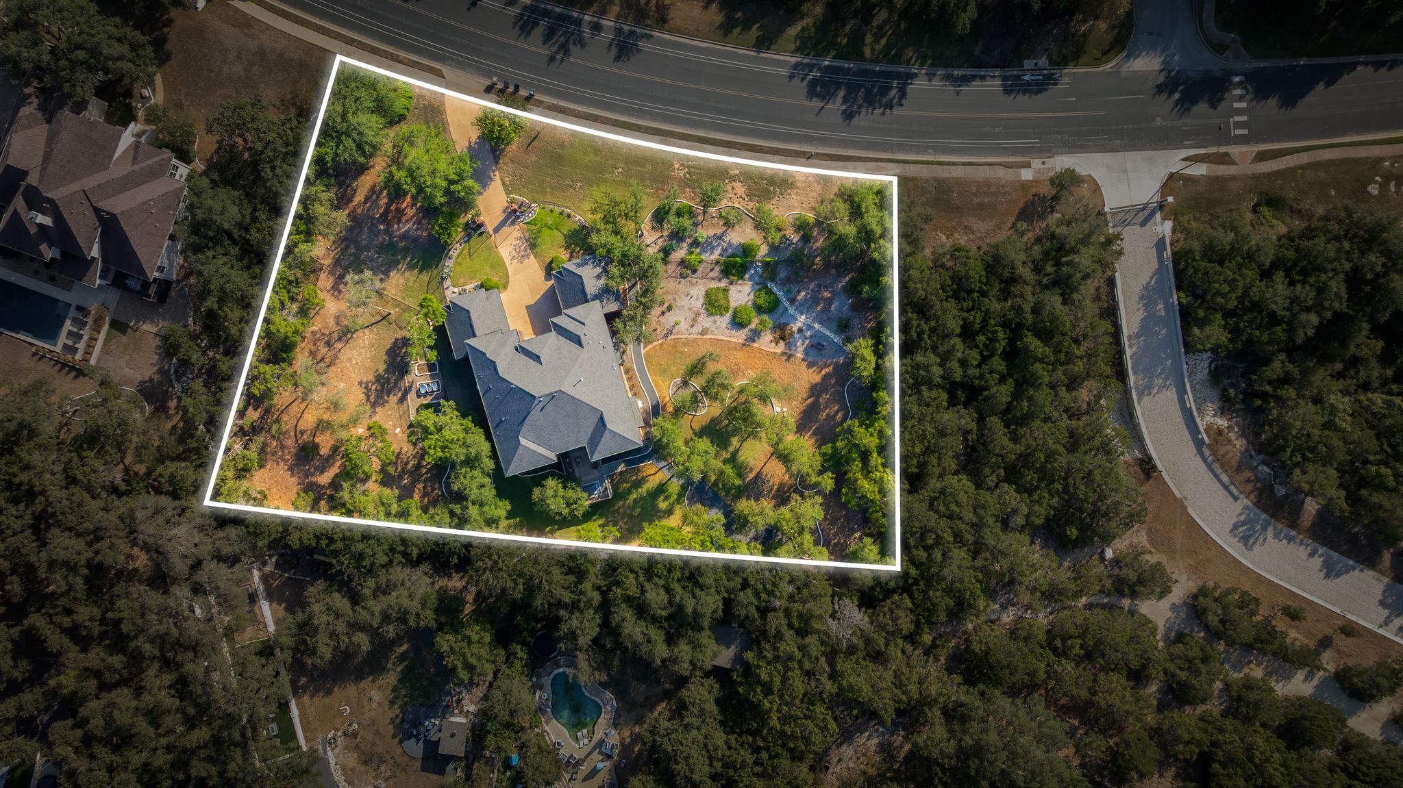 13612 Flat Top Ranch Road Austin, TX 78732 - Photo 40 of 40 a view of a yard