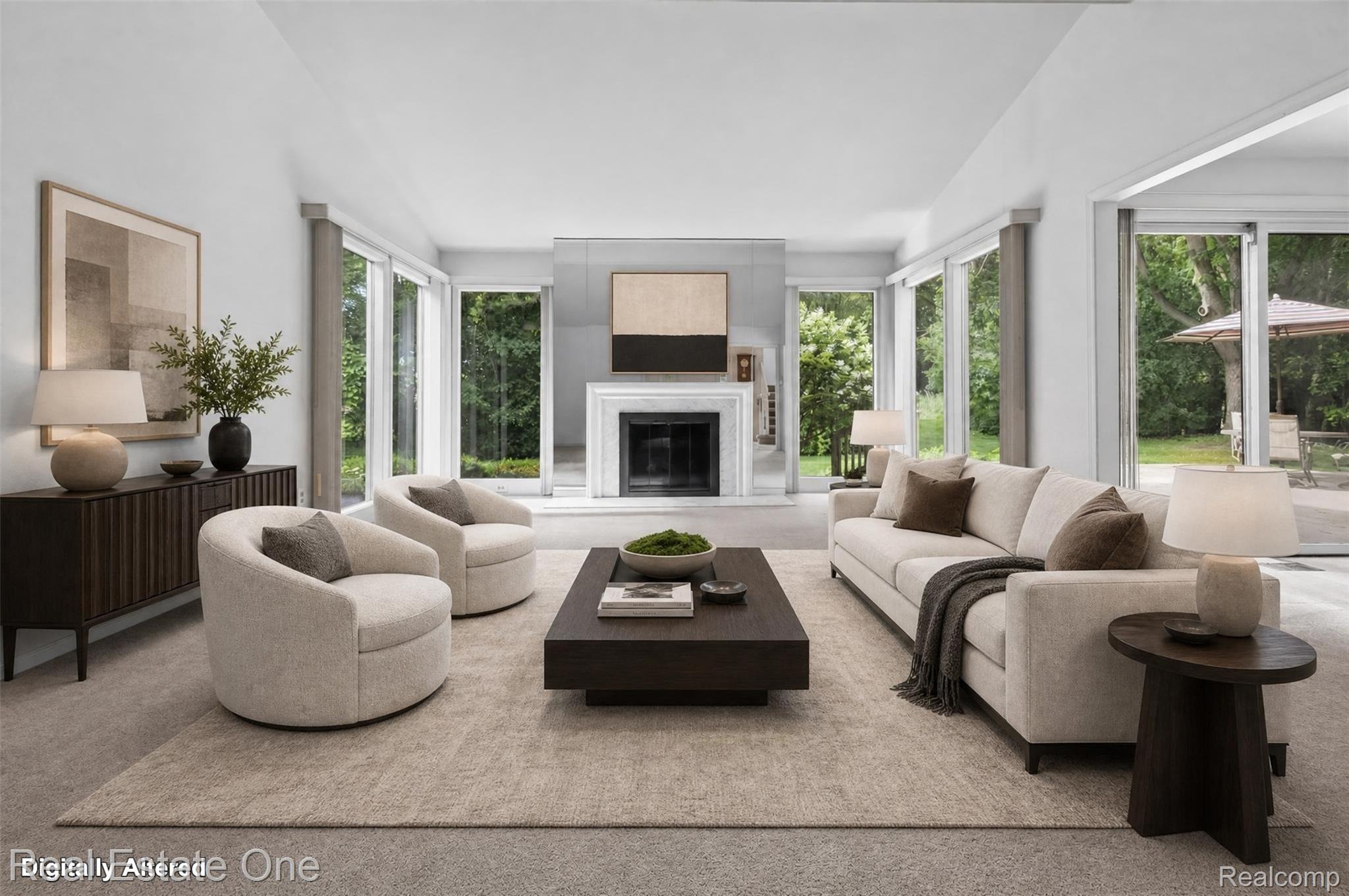 3400 Wedgewood Drive Rochester, MI 48306 - Photo 2 of 49 Spacious living area featuring a central fireplace and floor-to-ceiling windows