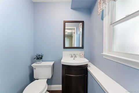 a bathroom with a sink and a toilet