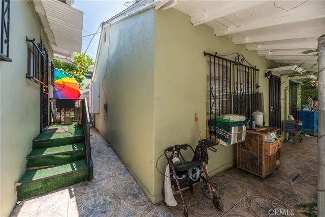 a view of a chairs and table in a patio