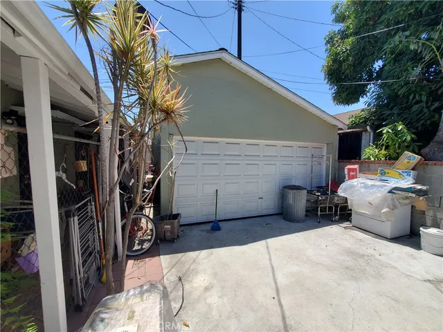 a view of a patio with storage and utility room