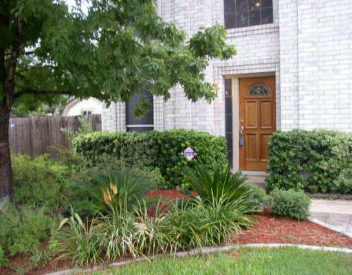 13109 Kellies Farm Lane Austin, TX 78727 - Photo 1 of 1 a front view of a house with garden