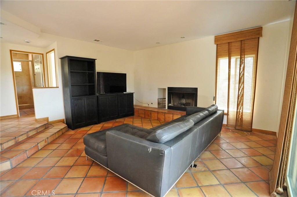 1707 Hygeia Avenue Encinitas, CA 92024 - Photo 11 of 41 a living room with furniture and a flat screen tv