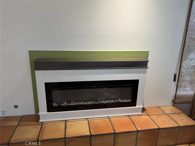 a fireplace with wooden floor