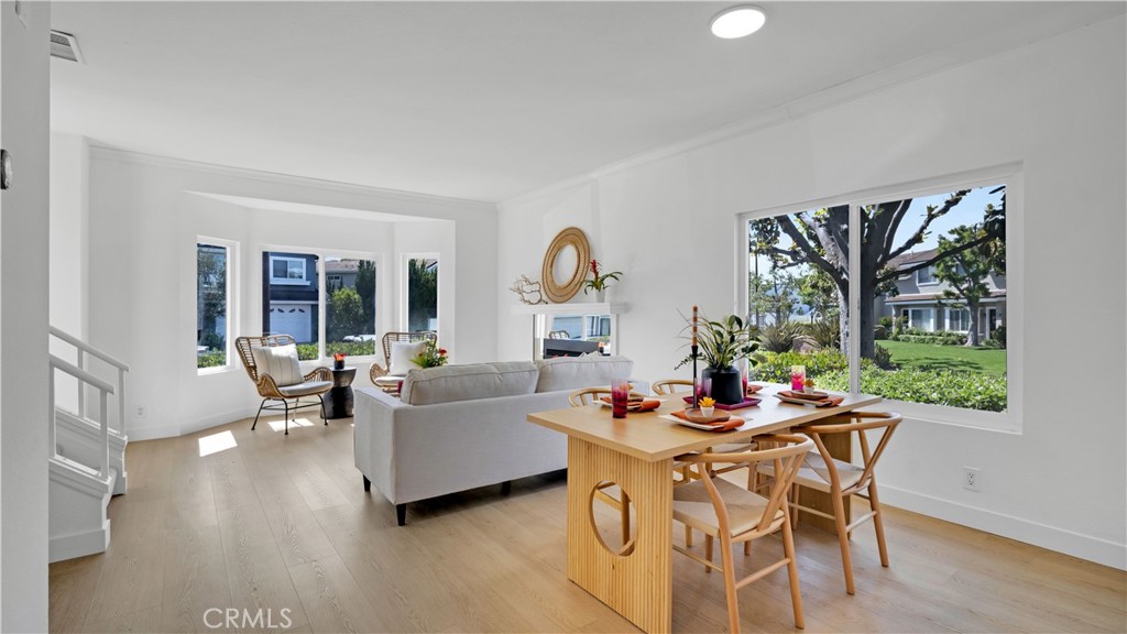 336 Fallingstar Irvine, CA 92614 - Photo 17 of 73 a dining room with furniture window and wooden floor