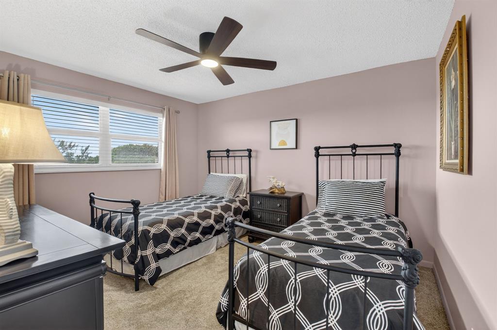 2601 Northeast 3rd Street, Unit 403 Boynton Beach, FL 33435 - Photo 15 of 33 a bedroom with double bed and a window