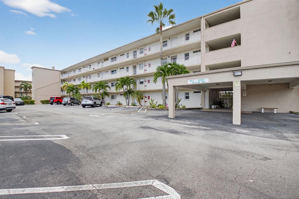 2601 Northeast 3rd Street, Unit 403 Boynton Beach, FL 33435 - Photo 20 of 33 a view of a building with a street