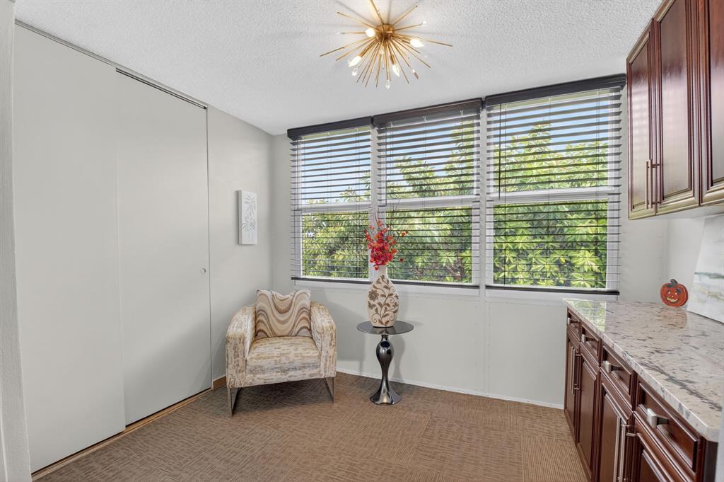 2601 Northeast 3rd Street, Unit 403 Boynton Beach, FL 33435 - Photo 10 of 33 a bedroom with a bed and a window