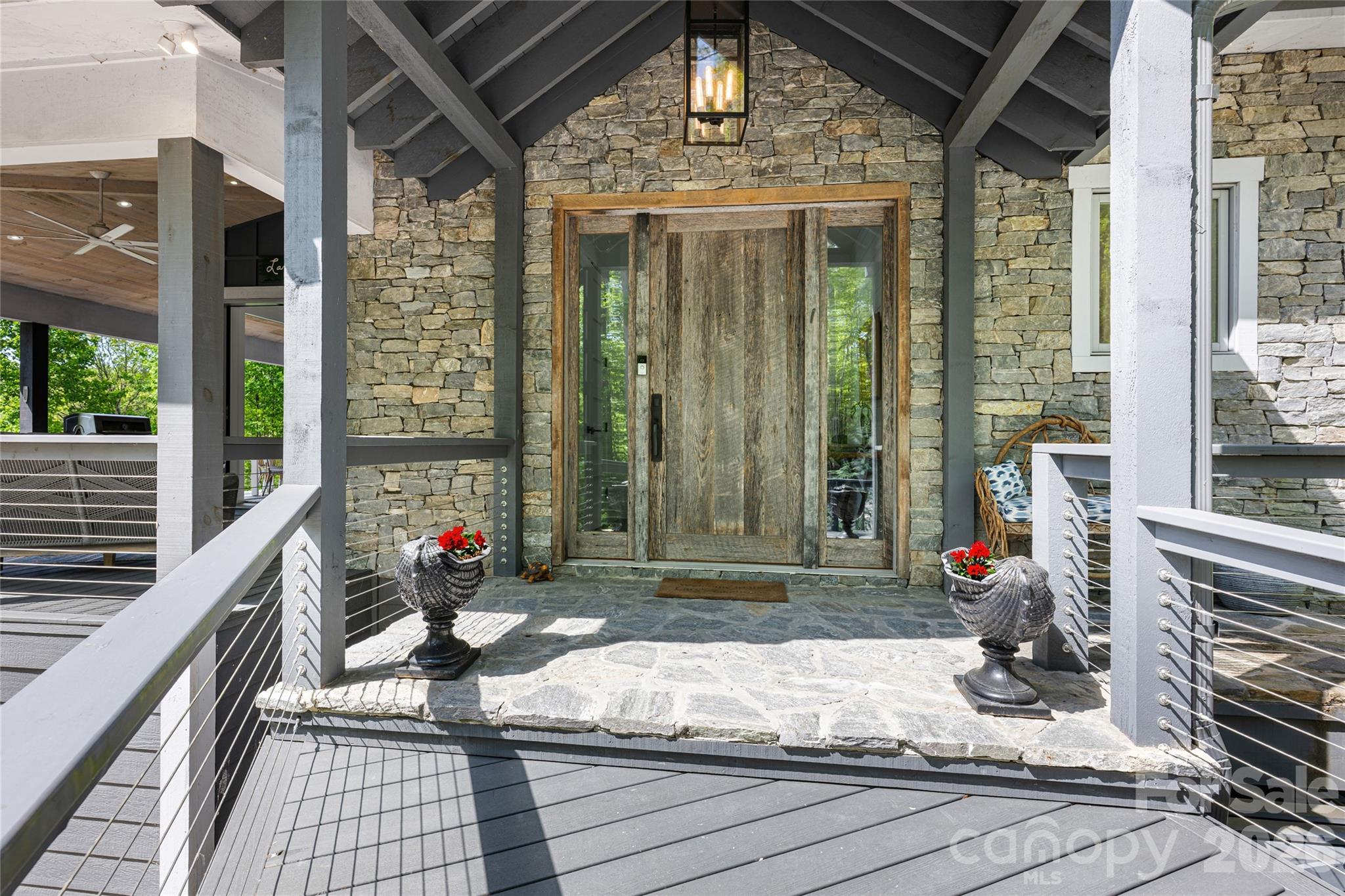2235 Cold Mountain Road Lake Toxaway, NC 28747 - Photo 2 of 47 a building outdoor space with seating space