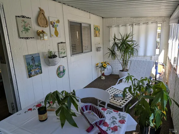 a vase of flowers sitting on a table