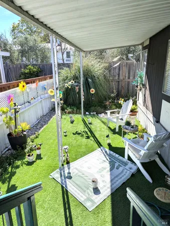 a view of yard with patio