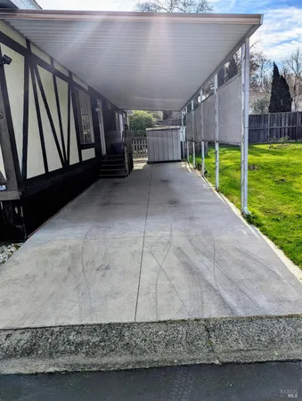 a car parked in front of garage