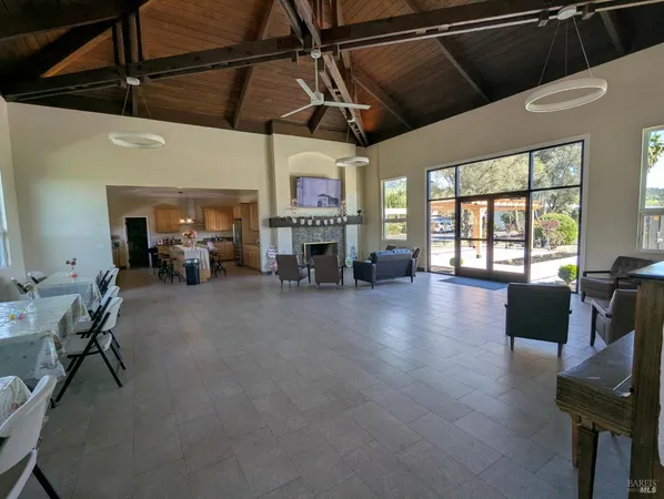 a view of a hallway with a flower pot