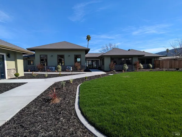 a house view with a outdoor space
