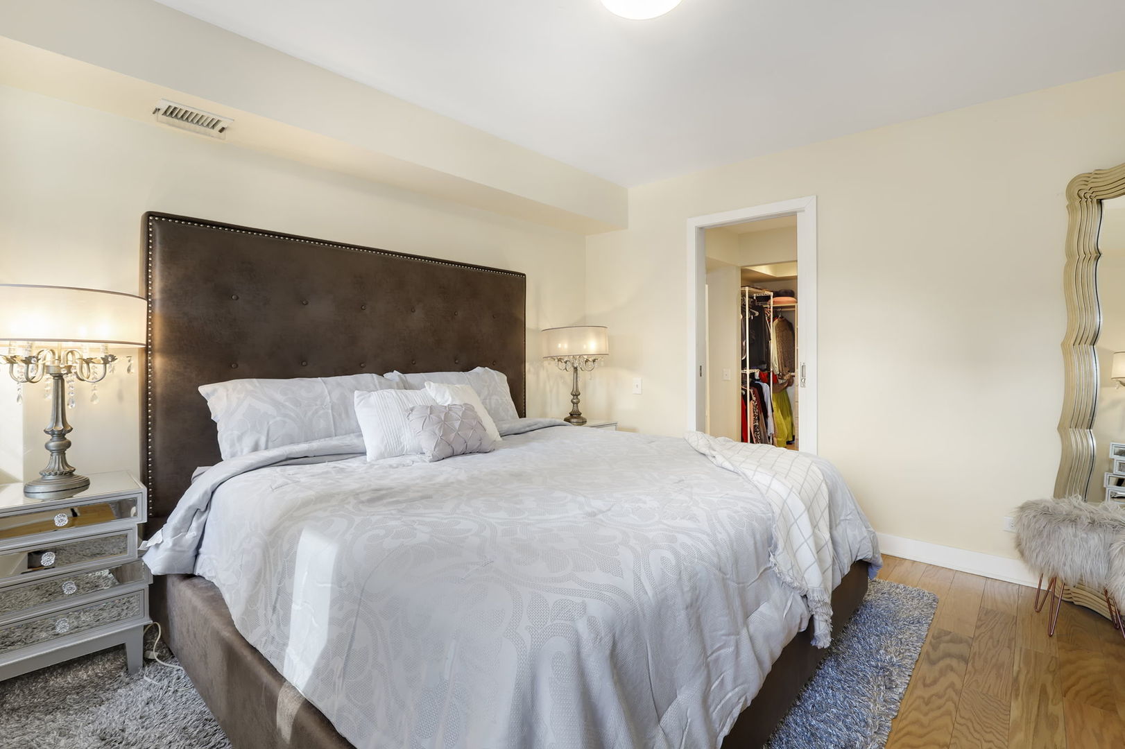 40 East 9th Street, Unit 716 Chicago, IL 60605 - Photo 13 of 37 a bed room with a bed and a television