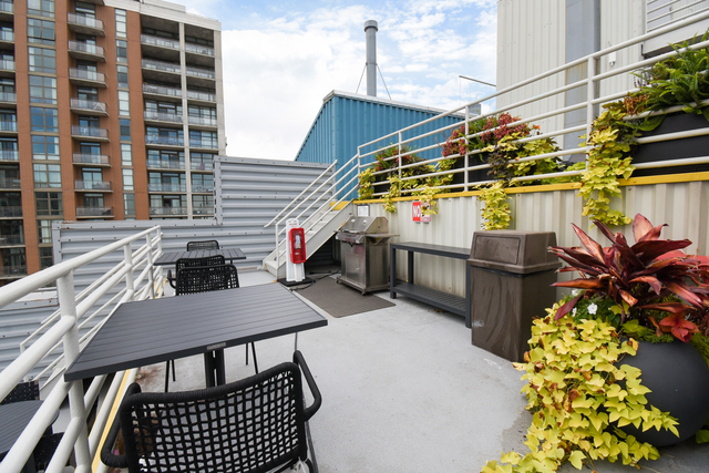 40 East 9th Street, Unit 716 Chicago, IL 60605 - Photo 36 of 37 a view of a house with a patio