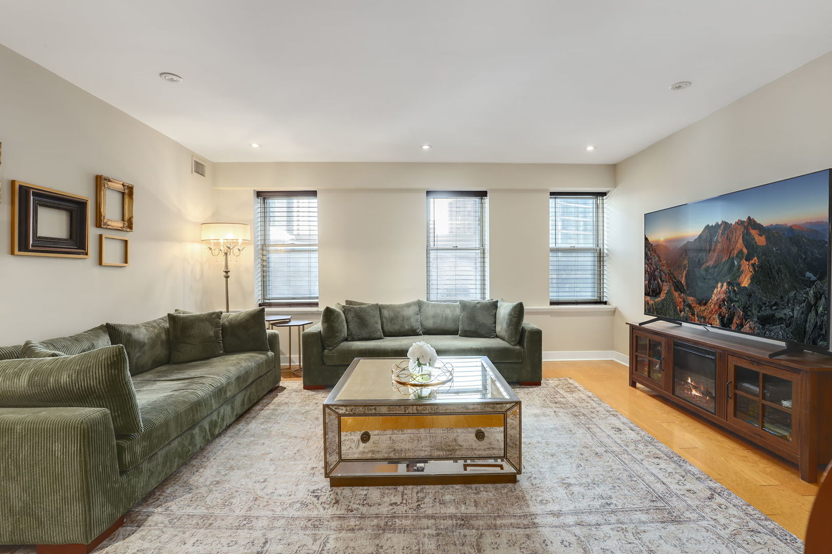 40 East 9th Street, Unit 716 Chicago, IL 60605 - Photo 6 of 37 a living room with furniture and a flat screen tv