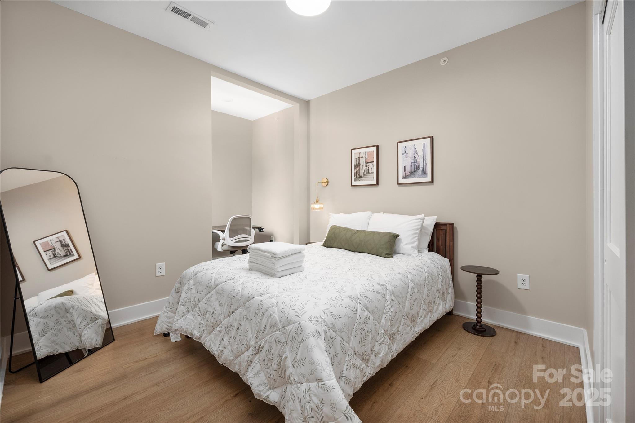 203 Grandin Road, Unit 3 Charlotte, NC 28208 - Photo 22 of 34 a bedroom with bed and window