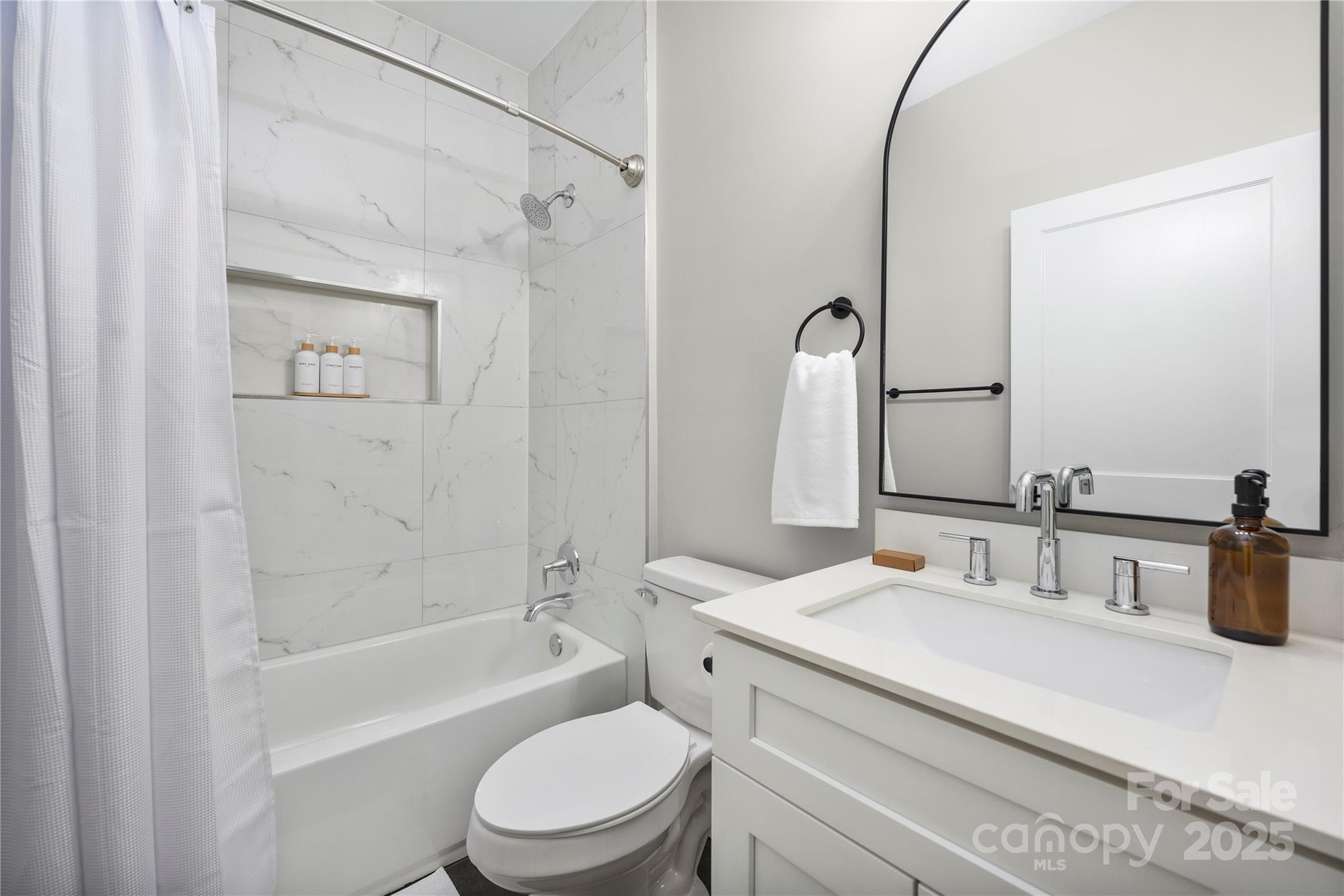 203 Grandin Road, Unit 3 Charlotte, NC 28208 - Photo 26 of 34 a bathroom with a granite countertop sink toilet and shower