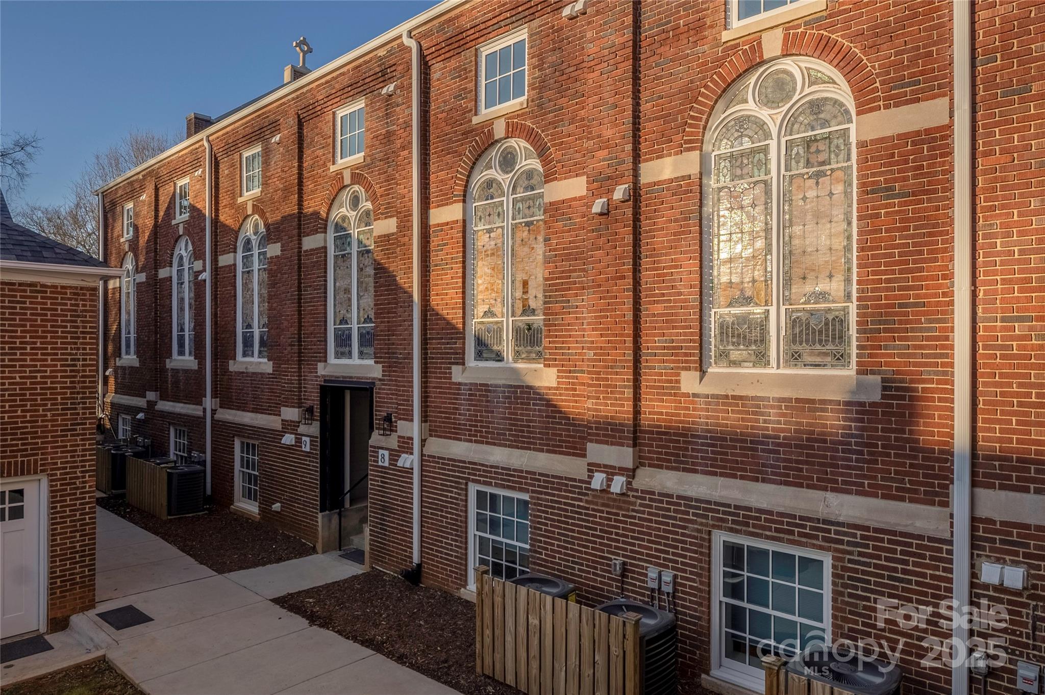 203 Grandin Road, Unit 3 Charlotte, NC 28208 - Photo 30 of 34 a view of a brick building with a window