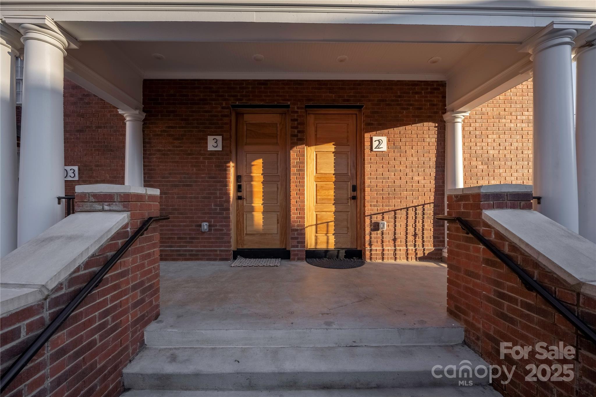 203 Grandin Road, Unit 3 Charlotte, NC 28208 - Photo 32 of 34 a view of an entryway with a fireplace