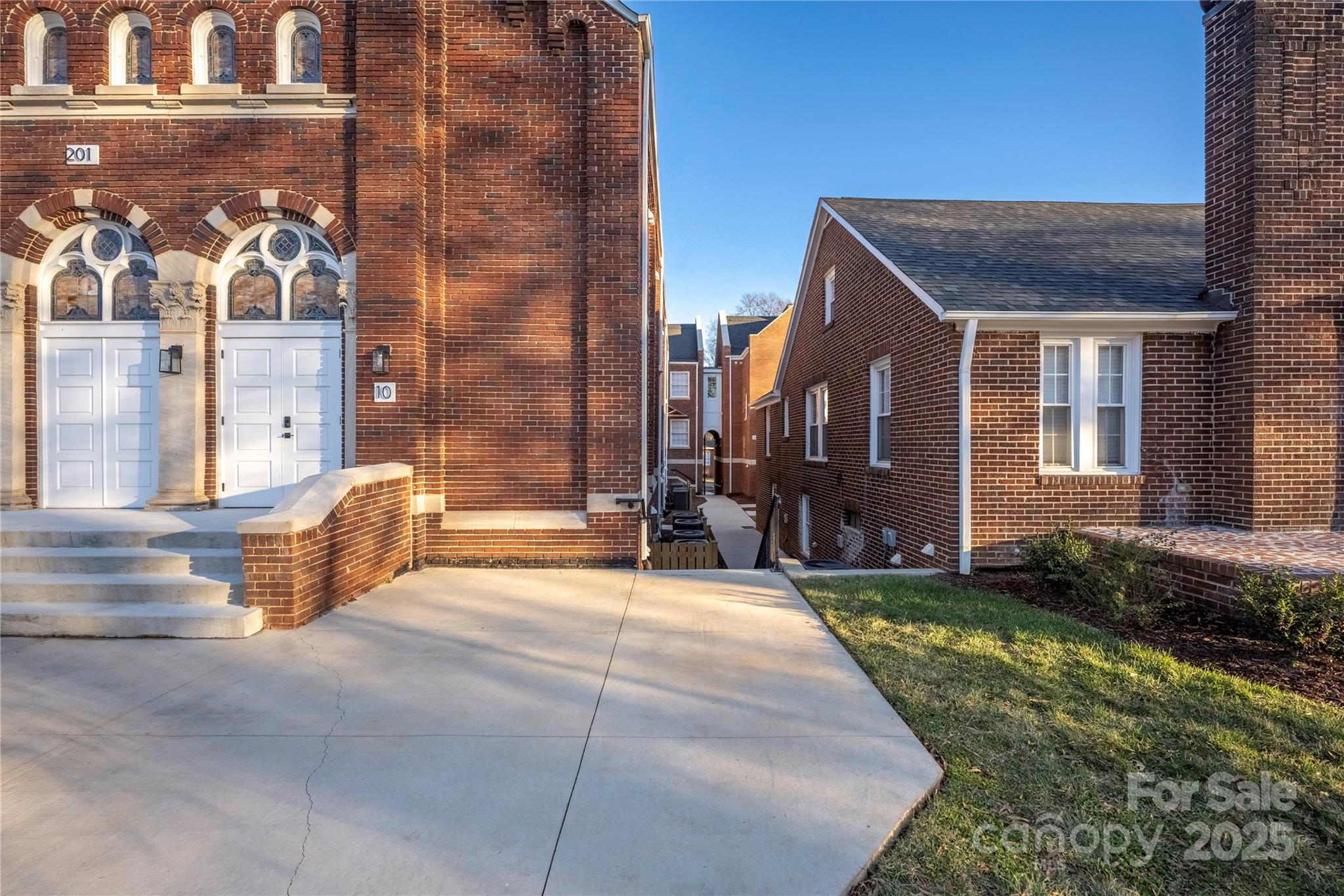 203 Grandin Road, Unit 3 Charlotte, NC 28208 - Photo 33 of 34 a view of a house with brick walls