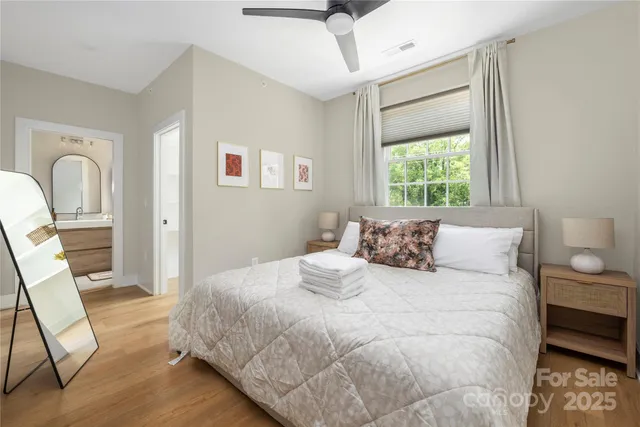 a large white bed in a white room