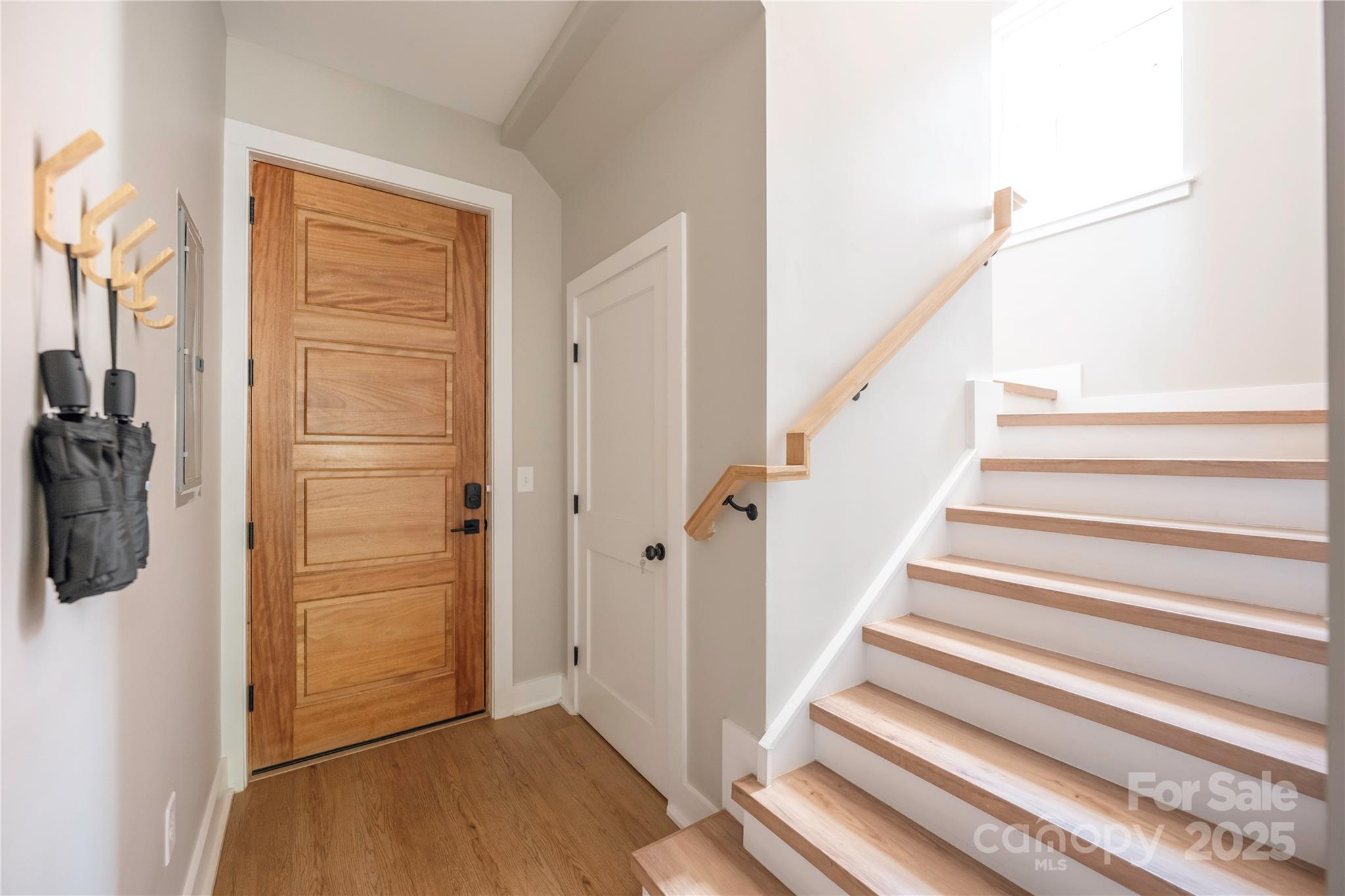 203 Grandin Road, Unit 3 Charlotte, NC 28208 - Photo 6 of 34 a view of a hallway with closet and wooden floor