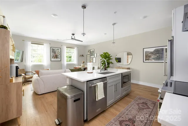 a view of living room with granite countertop furniture and fireplace