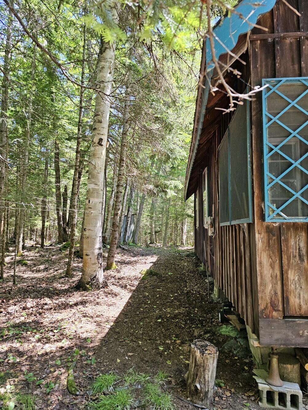 42 Bald Mountain Road Oquossoc, ME 04964 - Photo 24 of 30 Side of House